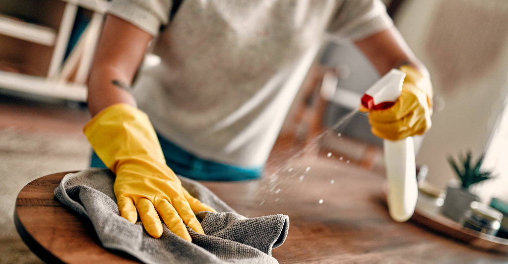 Cleaner carrying out domestic cleaning in Leeds